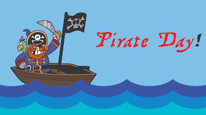 cartoon pirate on a ship and the words Pirate Day.